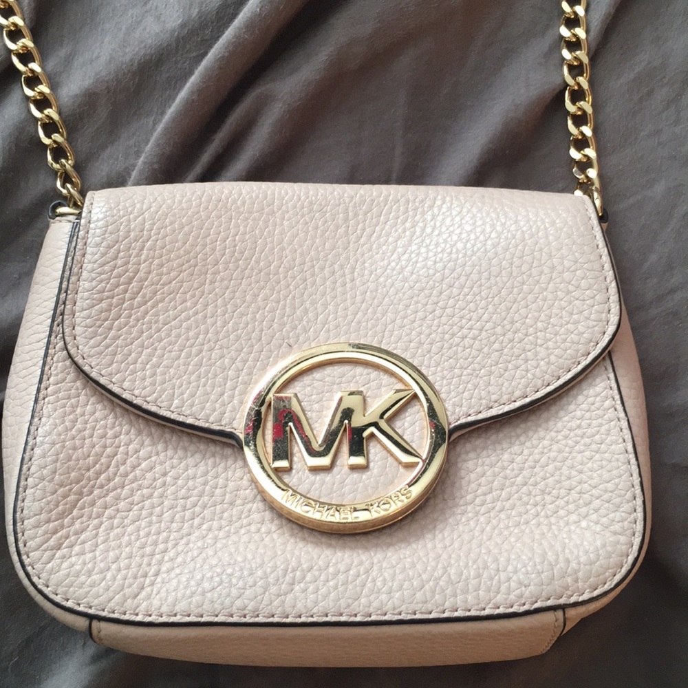 Michael Kors small side purse. Color: Nude
